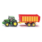 John Deere Traktor s prikolico za silažo