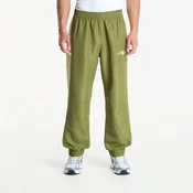 Hlače New Balance Trackside Woven Pant Sport Green/ Fennel Seed XL