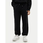 Tommy Hilfiger Spodnji del trenirke KS0KS00715 M Črna Regular Fit