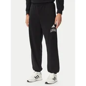 adidas Spodnji del trenirke Seasonal Essentials Collegiate French Terry Cuffed KF4264 Črna Regular Fit
