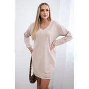Dress with pockets and beige V-neckline