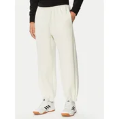 adidas Spodnji del trenirke Soft Lux KF8574 Kremna Regular Fit