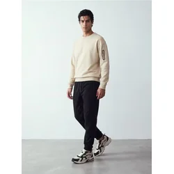Sinsay - Crewneck duks sa džepom na rukavu - nude