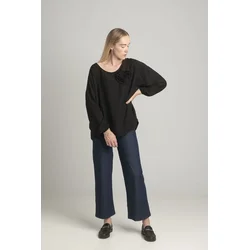 Black oversize blouse with a decorative flower