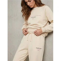 Sinsay - Regular jogger fleece pantalone sa vezenim natpisom NYC - nude