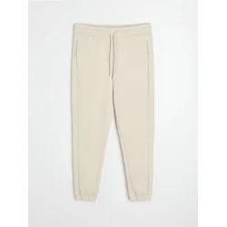 Sinsay - Tapered fit pantalone Active - nude
