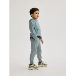 Reserved - Bombažne hlače jogger - temno turkizna