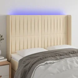 Vidaxl vidaXL Vzglavje postelje z LED diodami kremne barve 147x16x118/128 cm blago