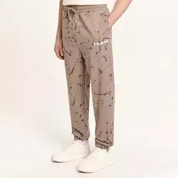 Cropp - Sportske jogger pantalone s printom preko cele površine - BEŽ