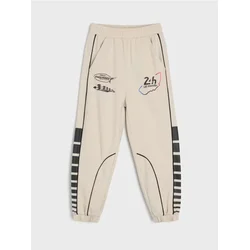 Sinsay - Jogger trenerke Le Mans - krem