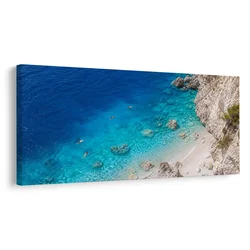 Slika skalnata obala in azurno morje - 100x50
