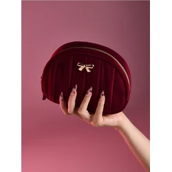 Sinsay - Kozmetička torbica sa zlatnim detaljima i mašnom - maroon