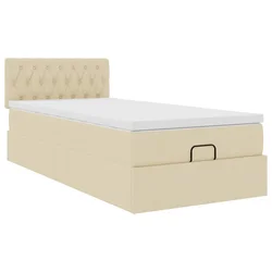 Vidaxl Otomanska postelja z vzmetnico krem 90x200 cm blago