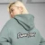 Puma PREMIUM Essentials Relaxed Graphic Hoodie Unisex, Green, Size XL, Clothing