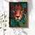 WallXpert uramljena MDF slika NAL031-46, lice leoparda tirkiznih očiju među tropskim lišćem, 35,5 x 47 cm