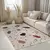 Kremno bela pralna preproga 60x100 cm Cracked Terrazzo – Mila Home
