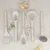 Berlinger Haus Set silikonskih kuhinjskih alatki sa stalkom Sahara Collection BH-8619, 6 komada, Krem