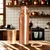 shumee Komplet Copper PURE: steklenička 950 ml + skodelica 250 ml + klasična zapestnica Gisane