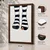 WallXpert uramljena MDF slika 3752KACT-039, noge u prugastim čarapama sa crvenim prstom kroz rupu, 37 x 52 cm