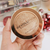 Revolution kompaktni bronzer - Bronzer Re-loaded - Holiday Romance // Blago z napako