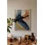 WallXpert uramljena slika 115235, crni labud u letu ispred zlatnonarandžastih krugova, 50 x 70 cm, beli ram