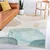 Kremno bel/turkizen pralen tekač 80x200 cm Puddle – Mila Home