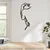 WallXpert metalni zidni ukras DCV-1044-MT, linijski ženski profil sa šakom, 50 x 20 cm, crni