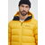 Pernata jakna Peak Performance za muškarce, boja: žuta, za zimu