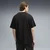 PUMA Essentials Elevated Tape Relaxed Tee Men, Men, Black, S