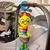 BABY EINSTEIN Igrača z ropotuljico na C-obroču Cal-a-Puller 0m+