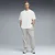 PUMA Graphics Training Tee Oversized Men, Clothing, White, S
