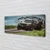 tulup.si Slika na platnu Auto field gore oblaki 125x50 cm