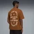 PUMA.NOW Tee Men, Clothing, Teak, S