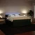 Vidaxl Box spring postelja z vzmetnico temno zelena 180x200 cm žamet