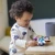 BABY EINSTEIN Senzorična igrača Curiosity Clutch ™ 3m +