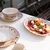 Bordo rdeča/slonokoščena porcelanasta skledica Cyril – S|P Collection