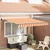 vidaXL Ročna zložljiva tenda Rumena in Oranžna 300x250 cm