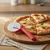 SCANPAN Kolesce za pizzo Spectrum/rdeče/inox, PP