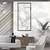WallXpert metalni zidni ukras 5303, dva lica nacrtana jednom linijom u uskom ramu, 26 x 60 cm, crni