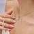 Brosway Srebrn obesek s cirkonom in biserom Fancy Infinite White FIW132