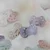 shumee Symmetrinen silikonitutti INFINITY M DUSKY LILAC 6m+, ruokalaput