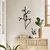 WallXpert metalni zidni ukras DCV-1016-MT, poljubac dva linijska profila, 50 x 28 cm, crni