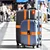 INF Pas za prtljago z nalepko z naslovom Orange, (21276059)
