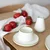 DUKA Porcelanasta skodelica DUVE z zelenim robom 450 ml