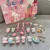 ADVENTNI KOLEDAR 24 OKEN HELLO KITTY PRSTANI OBESKI MAČKE