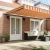 vidaXL vidaXL Ročna retraktibilna tenda v rumeni in oranžni barvi 500x350 cm, (22146047)