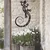 WallXpert metalni zidni ukras 5084, ornamentalni gušter sa spiralnim repom, 46 x 75 cm, crni