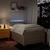 Vidaxl Box spring postelja z vzmetnico krem 120x200 cm blago