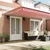 Skrovita tenda Crvena i bijela 500 × 300 cm Tkanina i Metal