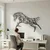WallXpert metalni zidni ukras 5570, konj u skoku od grana drveća, 100 x 53 cm, crni